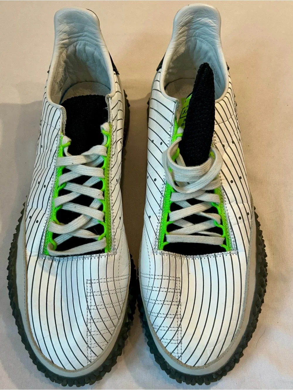 adidas mens Kamanda White Sneakers with Black and Neon Green Accents